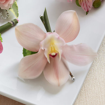 Pink Cymbidium Boutonniere –  Landers Flowers, Savannah MO