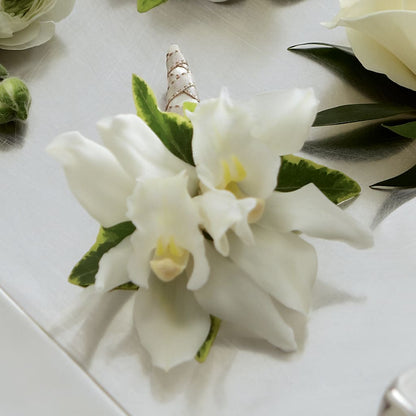 White Mini Cymbidium Boutonniere –  Landers Flowers, Savannah MO
